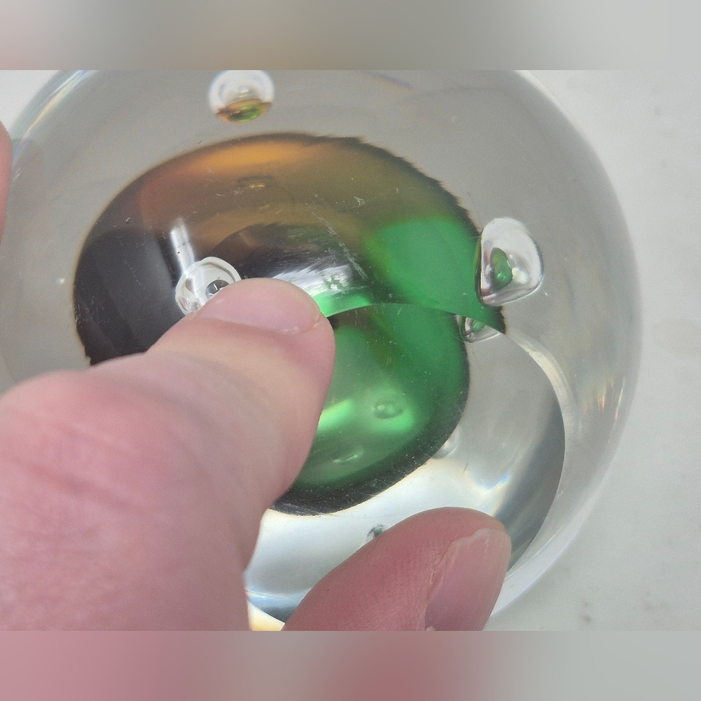 Clear Glass Paperweight With Green And Orange Irridecent Center - Picture 6 of 7